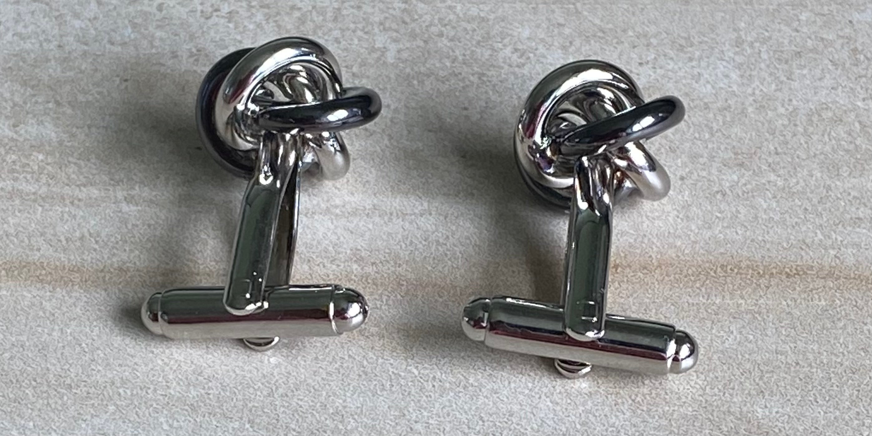 Silver and black coloured knot Cufflinks