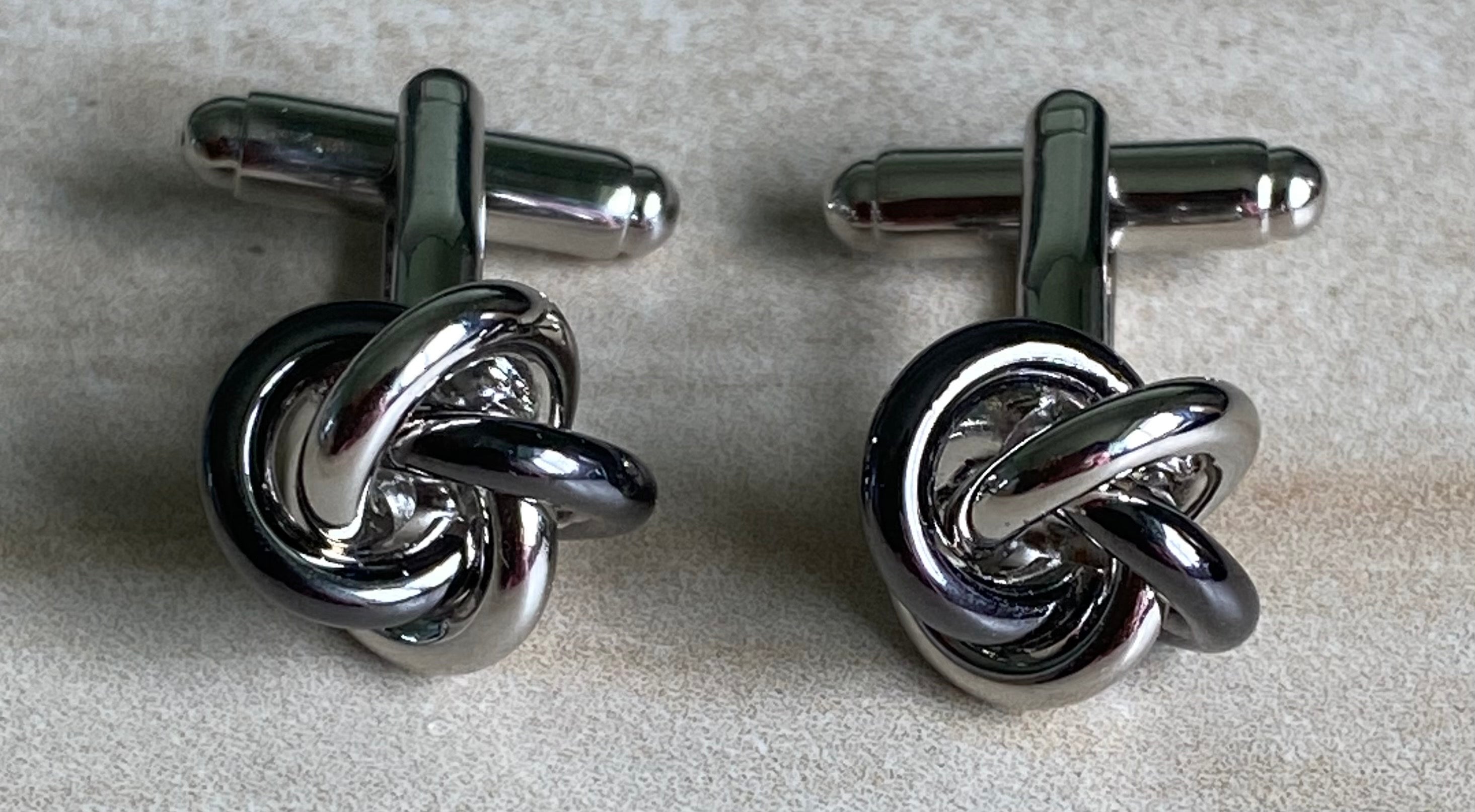 Silver and black coloured knot Cufflinks