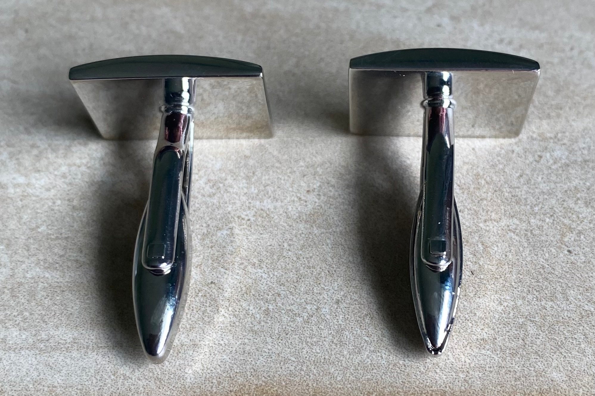 Striped black and silver curved rectangular cufflinks